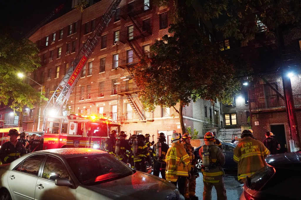 A 42-year-old man was taken into custody at the scene after firefighters successfully extinguished the blaze, according to the NYPD.