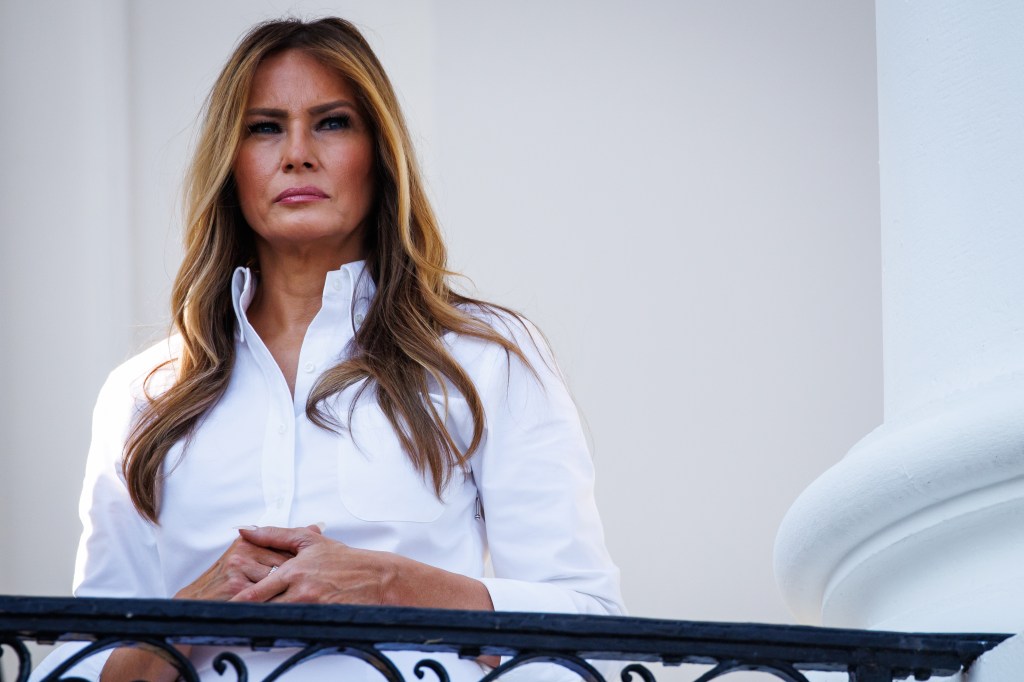 Melania Trump on a White House balcony.