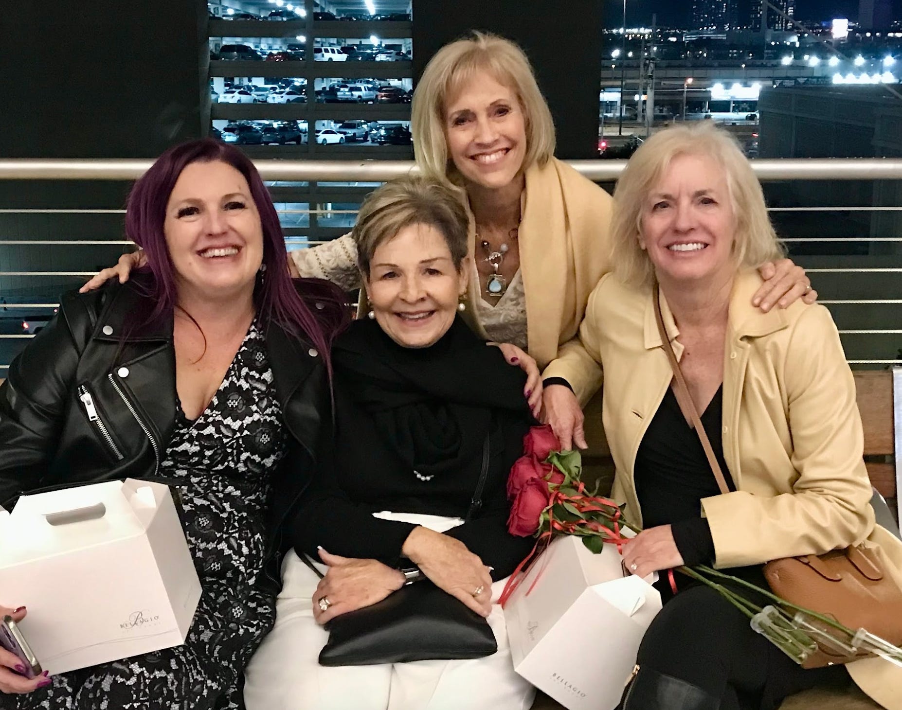 The writer, her sisters, and her mom at a restaurant in Las Vegas.