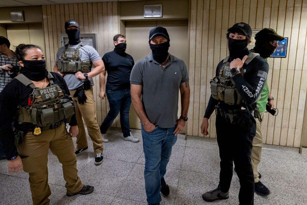 ICE agents in New York City courthouse.