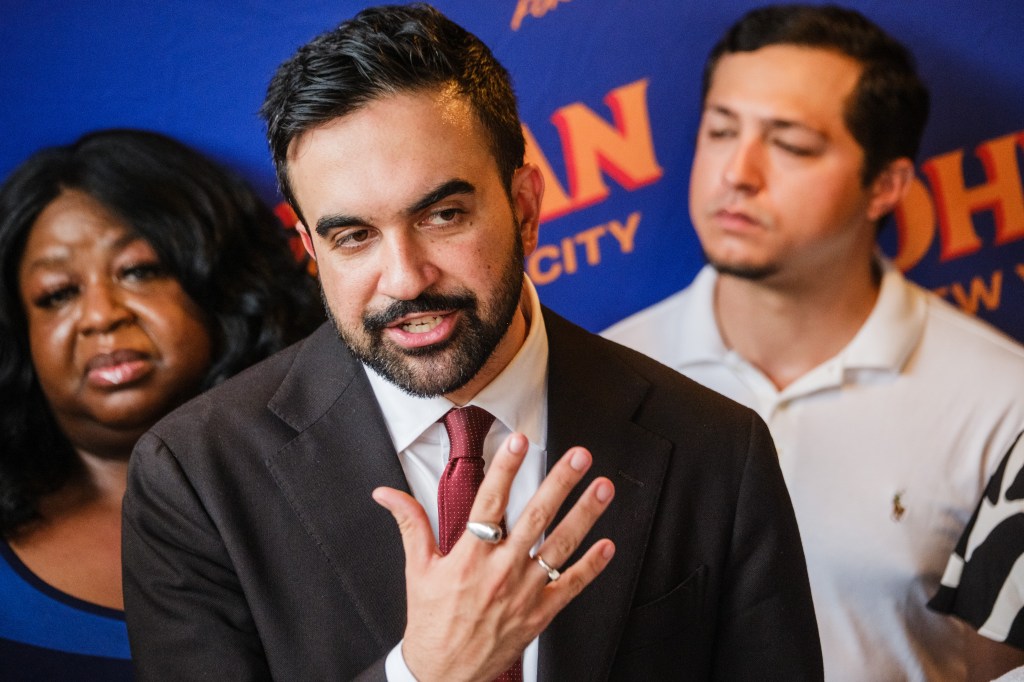 Zohran Mamdani speaking at a campaign event.