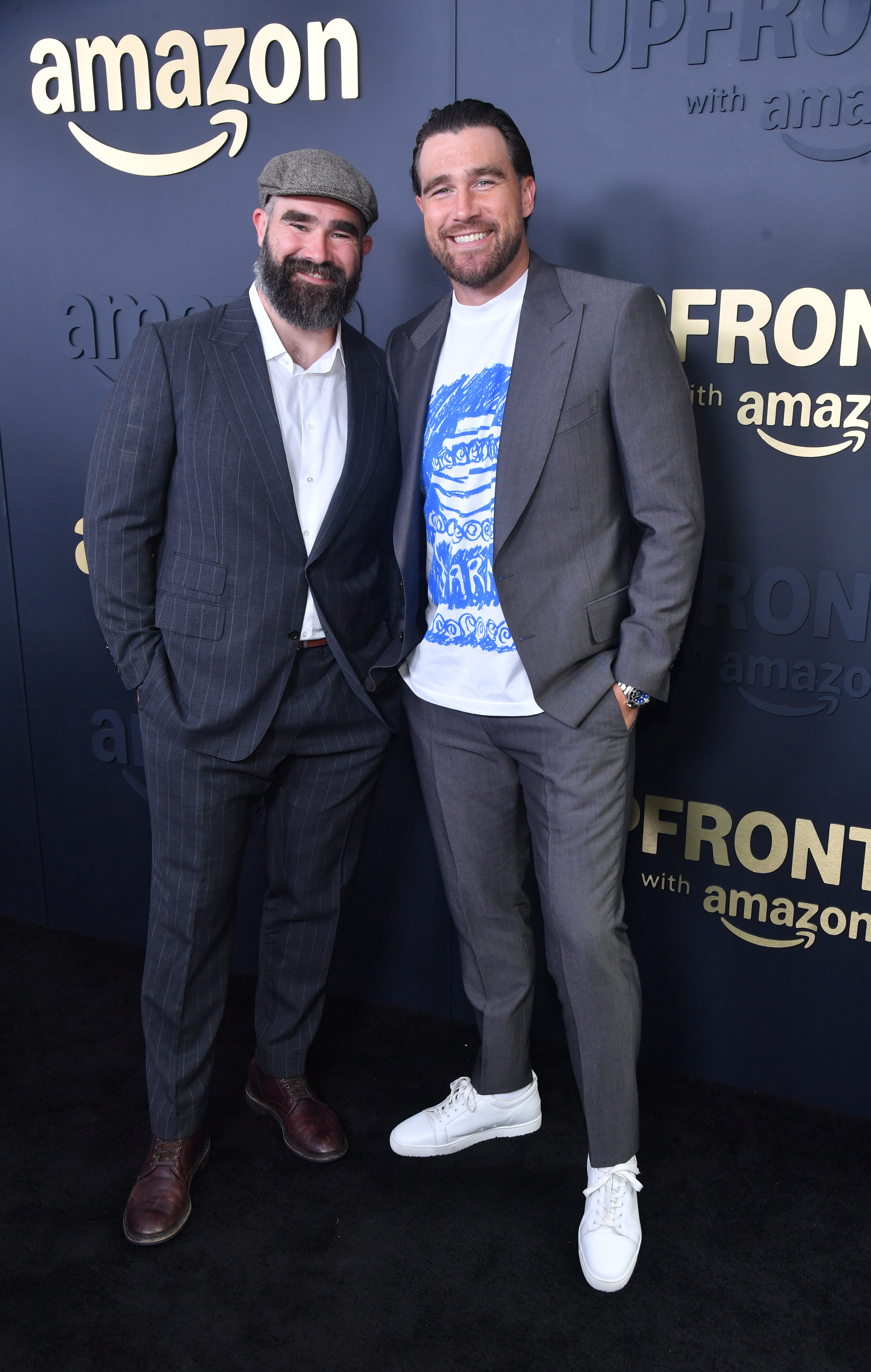Jason Kelce and Travis Kelce pose together.