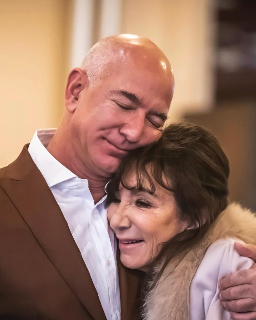 Jeff Bezos and Jackie Bezos pose together.