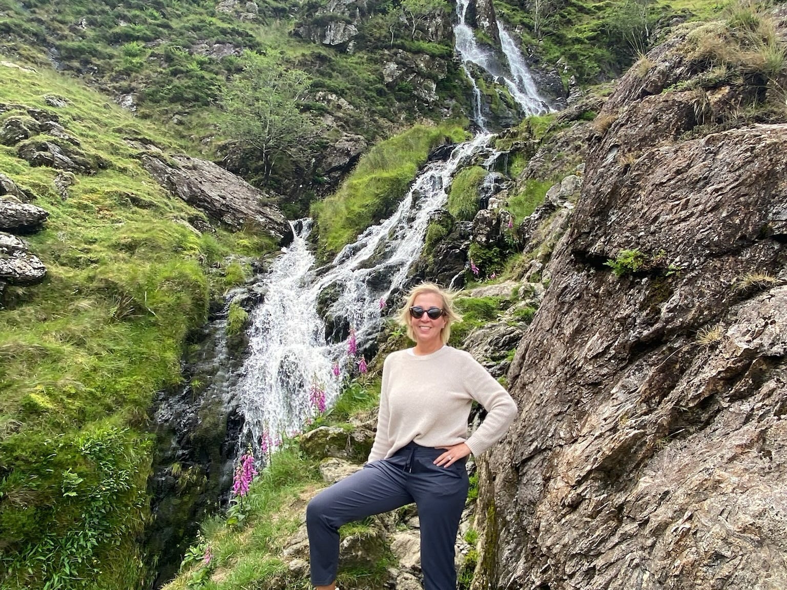 Kelly Benthall near a waterfall in the Lake District.