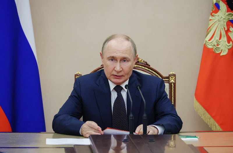 Putin at desk