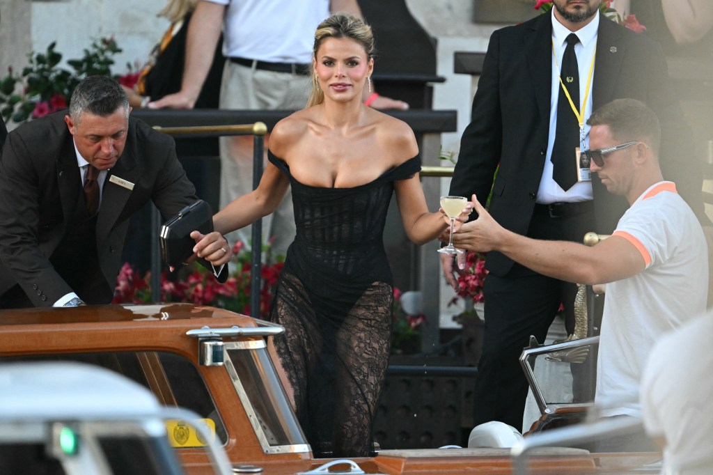 US model Brooks Nader leaves the Gritti Palace Hotel for a party on the third day of the wedding of US Amazon founder Jeff Bezos with Lauren Sanchez, in Venice on June 28, 2025. (Photo by Stefano Rellandini / AFP) (Photo by STEFANO RELLANDINI/AFP via Getty Images)