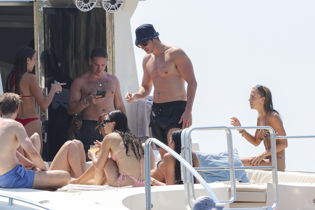 Dua Lipa and Callum Turner with friends in Ibiza.