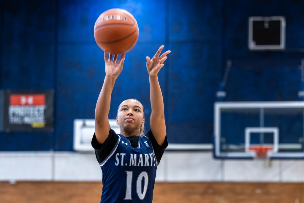 Centereach star Centereach star Delaney Walters shoots a jumper at St. Mary's high school gym.