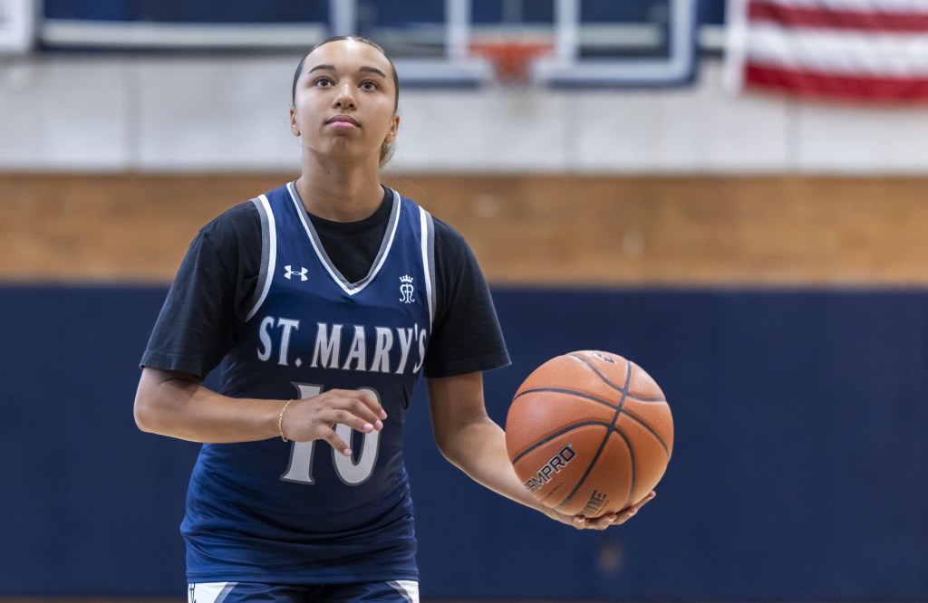 Delaney Walters gets ready to shoot at St. Mary's high school gym.
