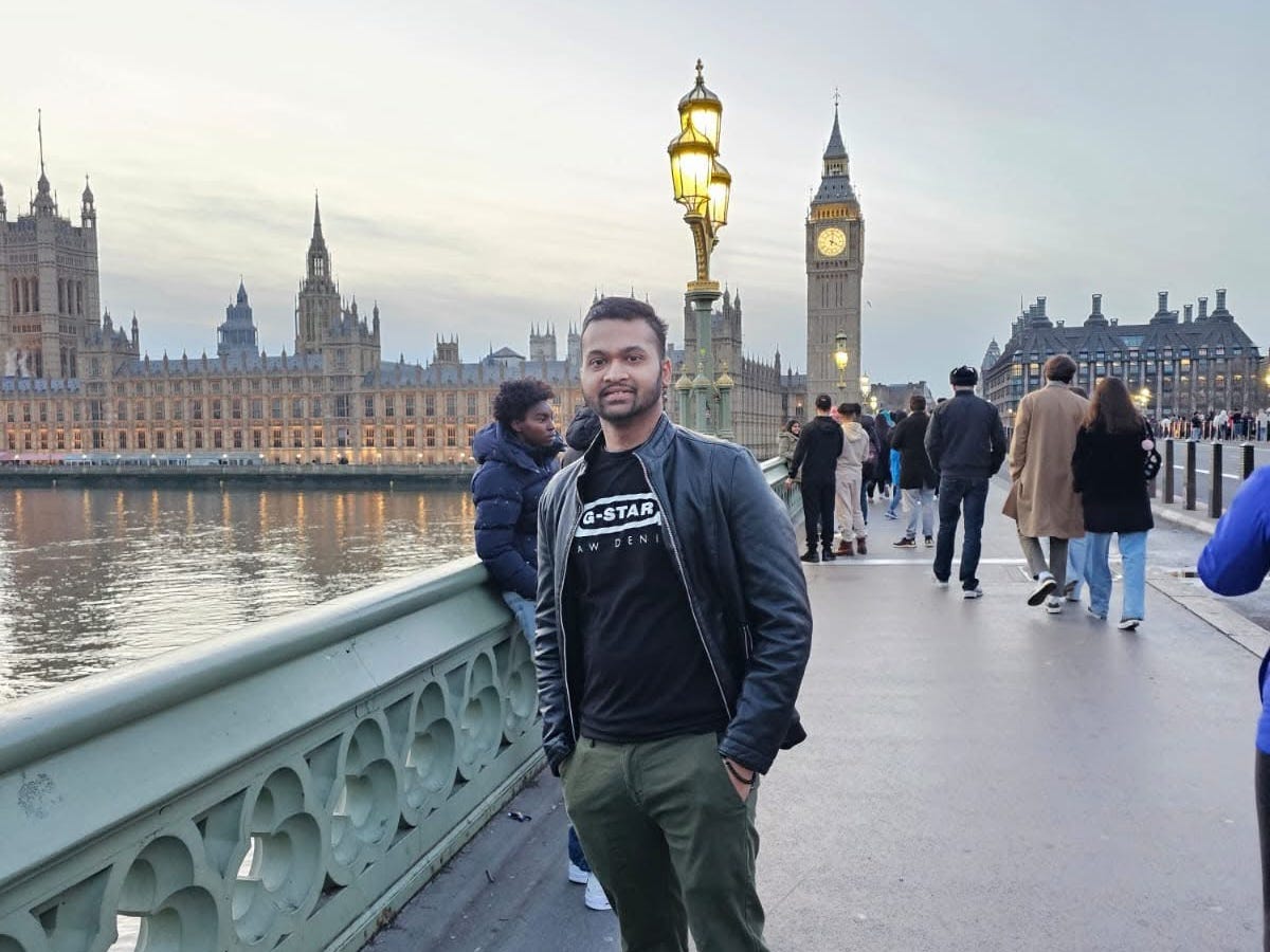 Mostofa Shakib in London standing in front of Big Ben.