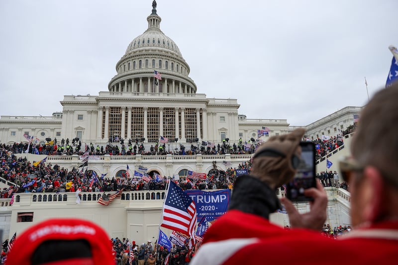Supporters of President Donald Trump gather outside the Capitol building in Washington D.C. on January 06, 2021. Rioters stormed the Capitol as lawmakers were set to sign off on President-elect Joe Biden's electoral victory.