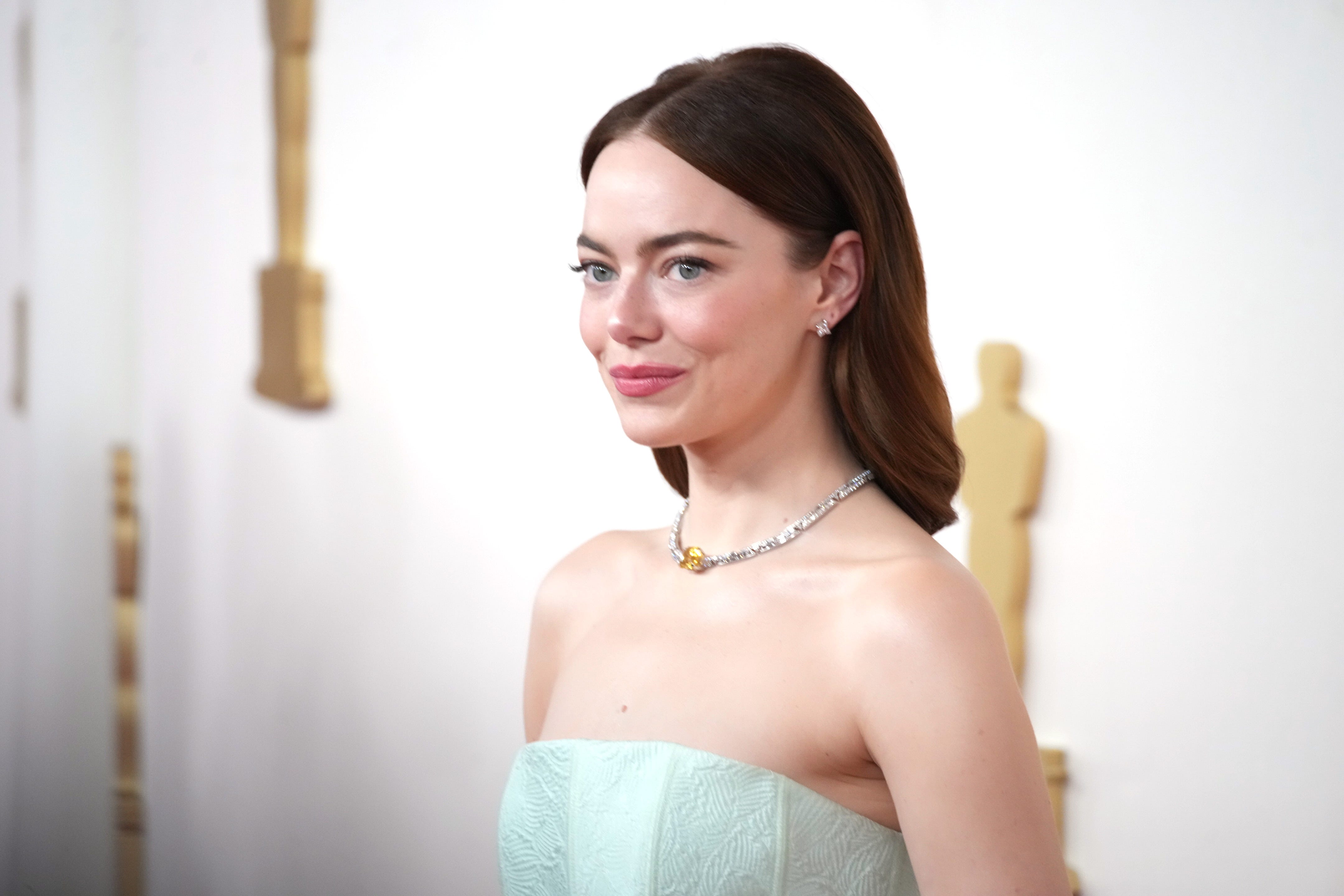 Emma Stone in a dress