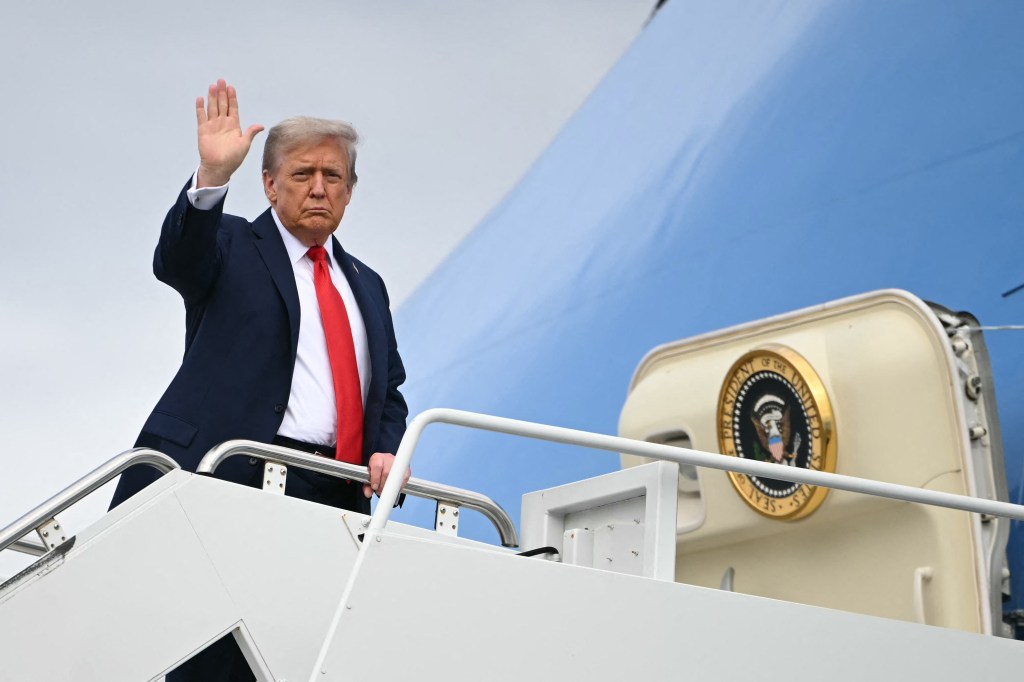 President Trump waving goodbye from Air Force One.