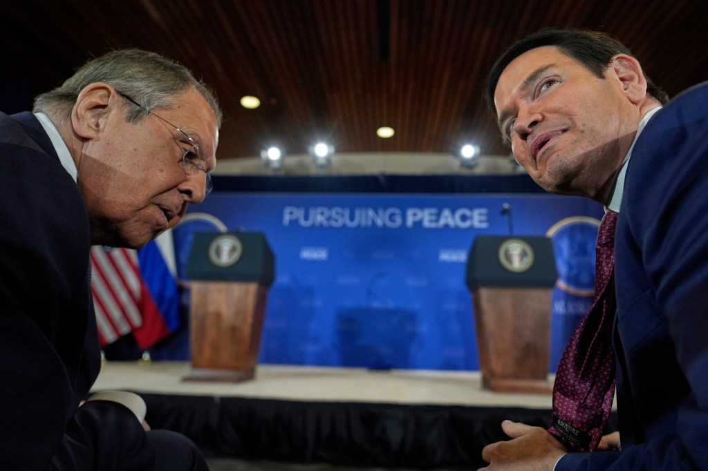 Sergey Lavrov and Marco Rubio in conversation.