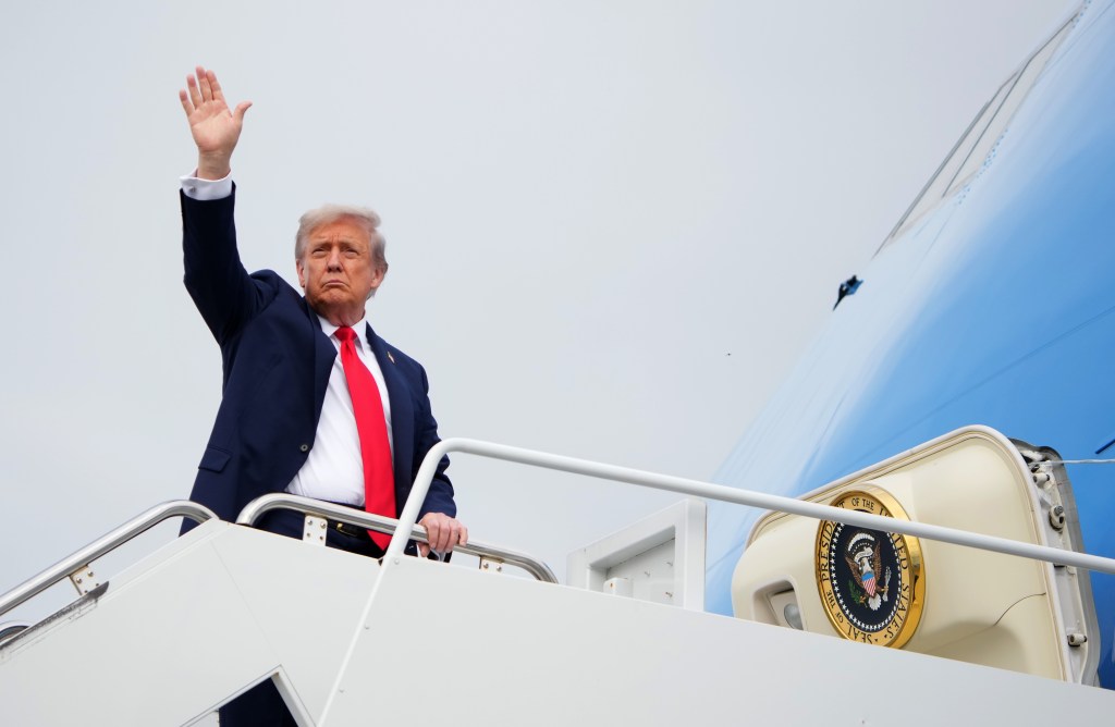 U.S. President Donald Trump boards Air Force One as he departs Joint Base Elmendorf-Richardson on August 15, 2025 in Anchorage, Alaska. 