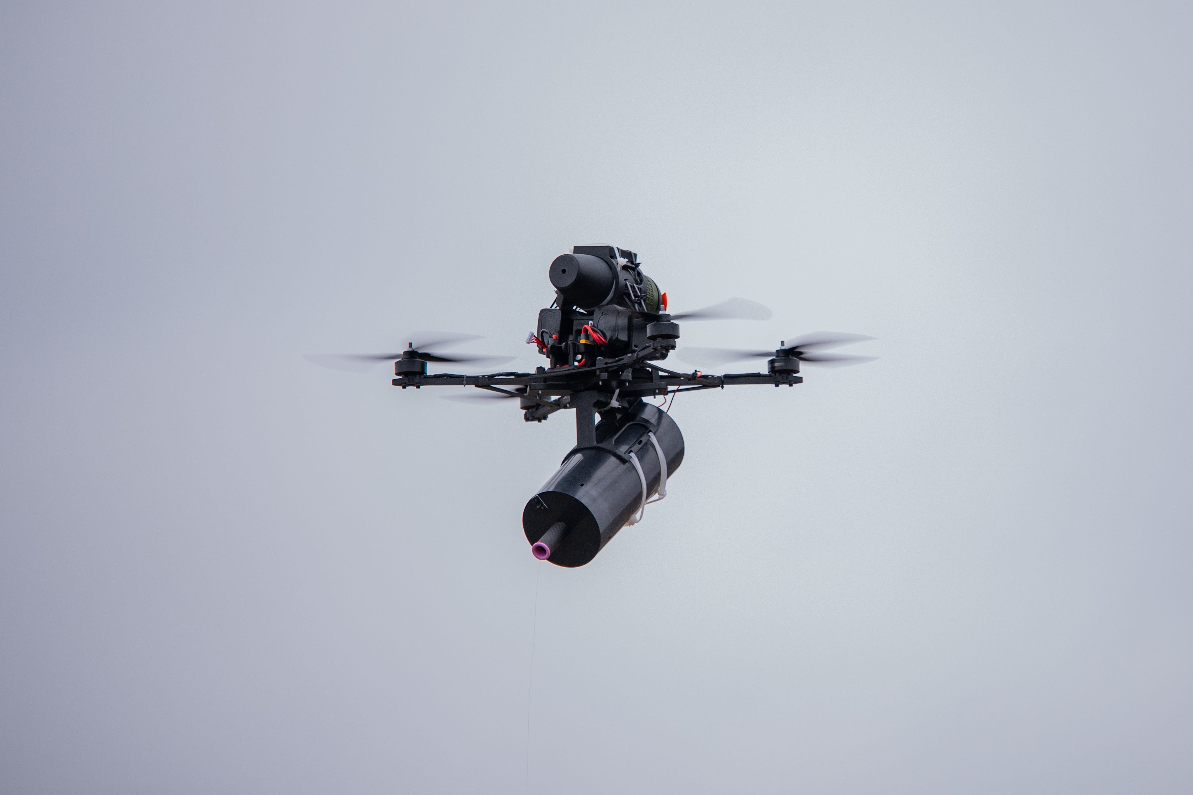 An FPV drone controlled via a fiber-optic cable flies during Ukrainian military training on January 29, 2025 in Kyiv Oblast, Ukraine.