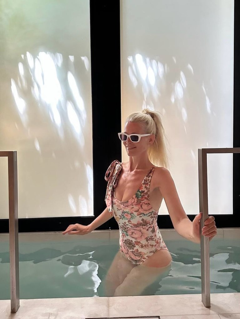 Perky Claudia Schiffer chills out with a quick cold plunge in her new Chloe bathing suit.
