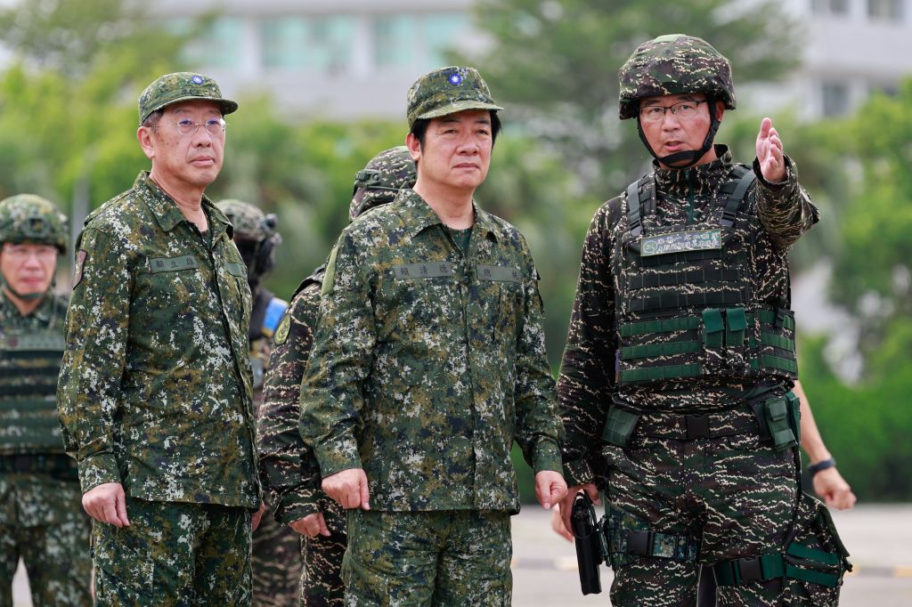 Taiwanese President Lai Ching-te observing a Taiwanese navy minelayer ship drill during Han Kuang military exercises.