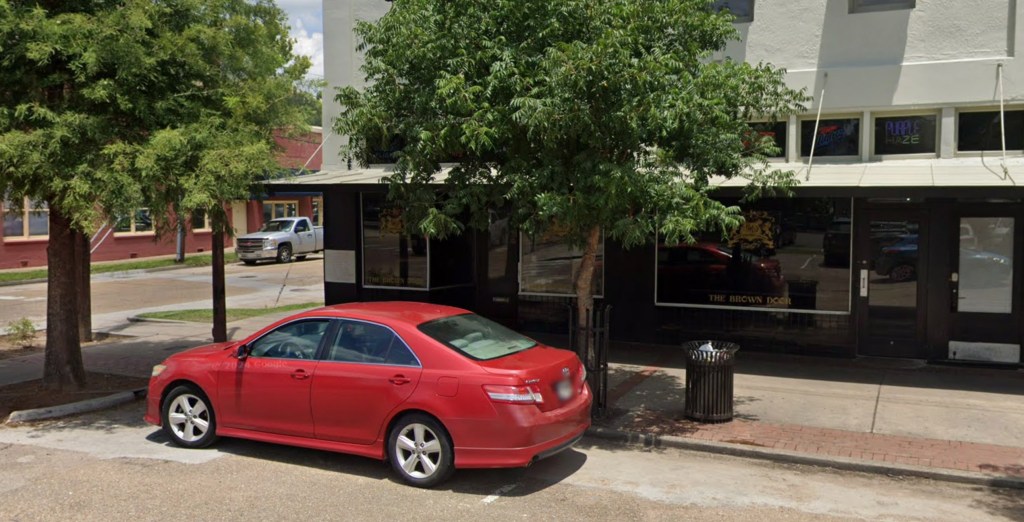 Street view of The Brown Door bar at 198 N Cate St in Hammond, Louisiana.