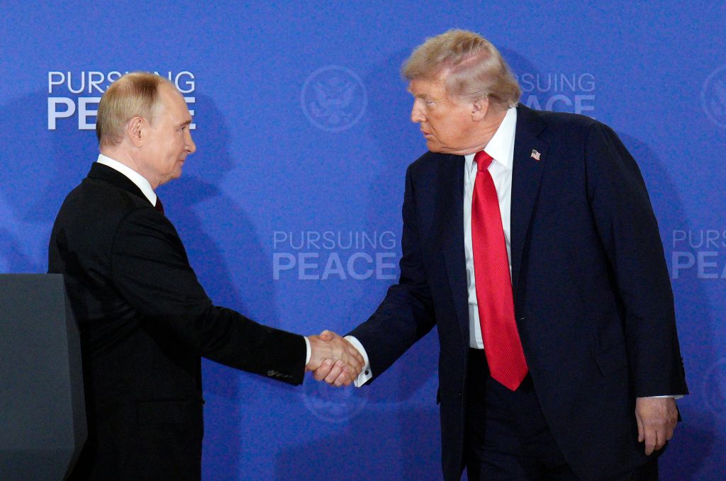 President Trump and Vladimir Putin shaking hands goodbye at the Alaska summit on Aug. 25, 2025