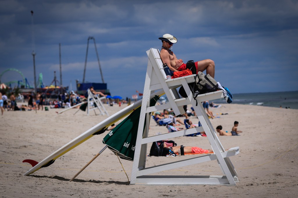 Lifeguard relaxing on a beach chair.