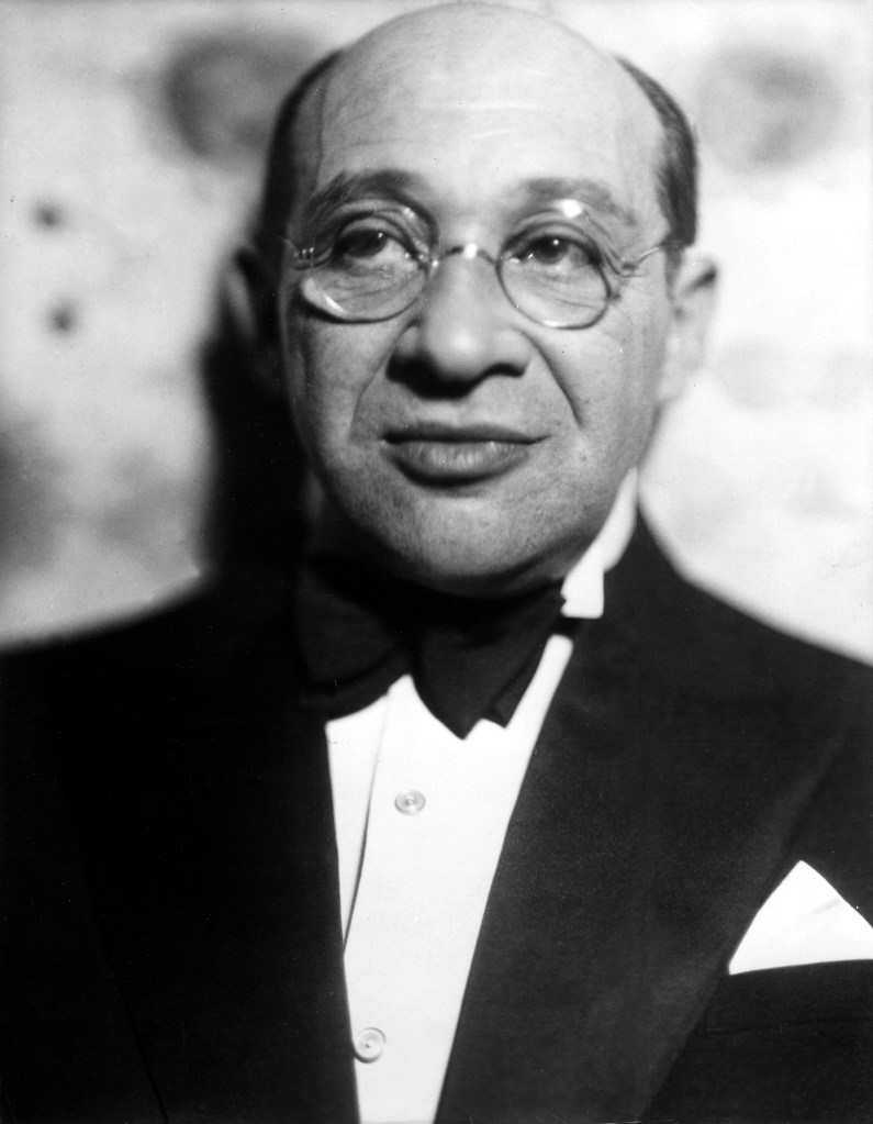 Black and white portrait of Fritz Grünbaum.