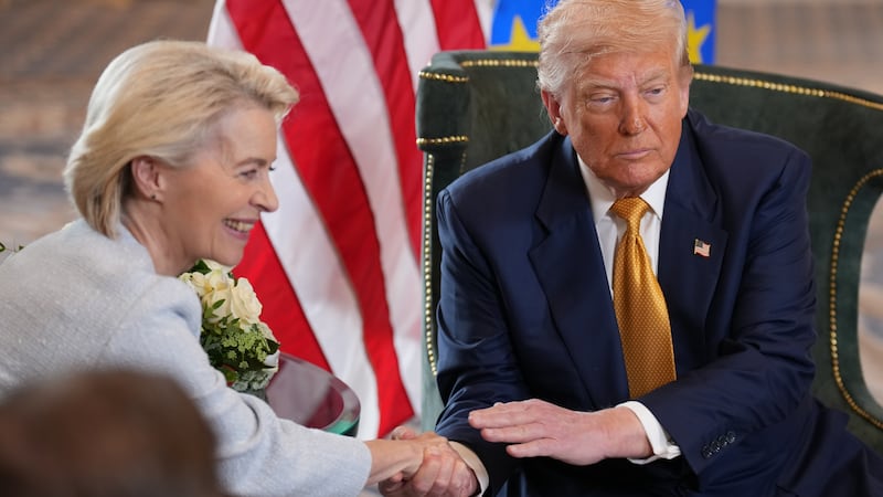 TURNBERRY, SCOTLAND - JULY 27: U.S. President Donald Trump and President of the European Commission Ursula von der Leyen shake hands as they announce a US-EU trade deal after a meeting at Trump Turnberry golf club on July 27, 2025 in Turnberry, Scotland. U.S. President Donald Trump is visiting his Trump Turnberry golf course, as well as Trump International Golf Links in Aberdeenshire, during a brief visit to Scotland from July 25 to 29. (Photo by Andrew Harnik/Getty Images)