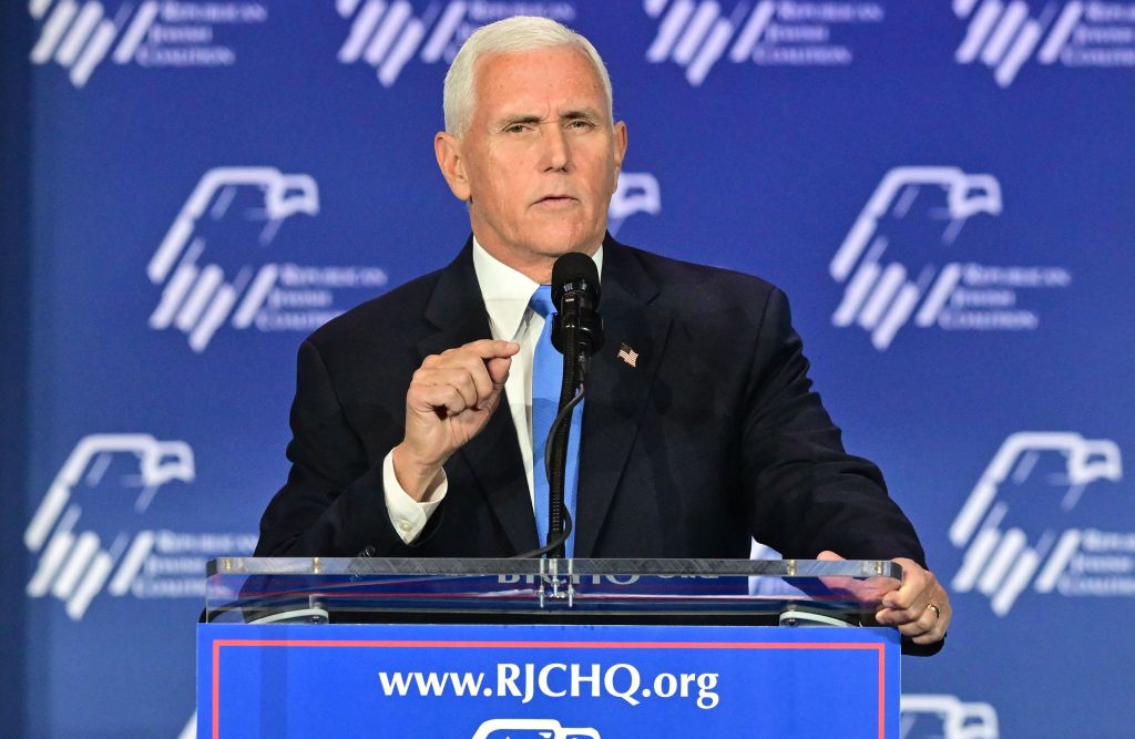 Mike Pence speaking at a podium.