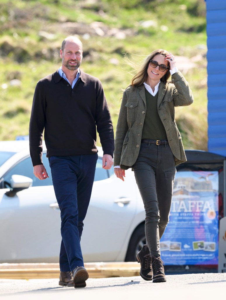 Prince William and Kate Middleton walking.