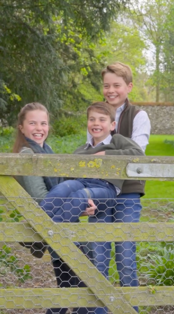 Princess Charlotte and Prince George carrying Prince Louis.