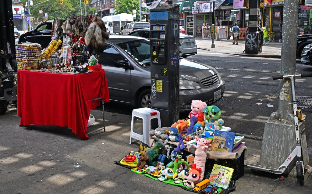 Street vendors selling household goods and toys in Jackson Heights, Queens.