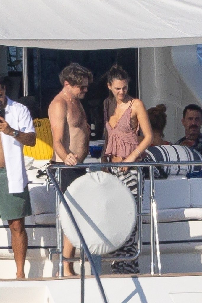 Leonardo DiCaprio and Vittoria Ceretti vacationing with friends on a luxury yacht off Formentera.