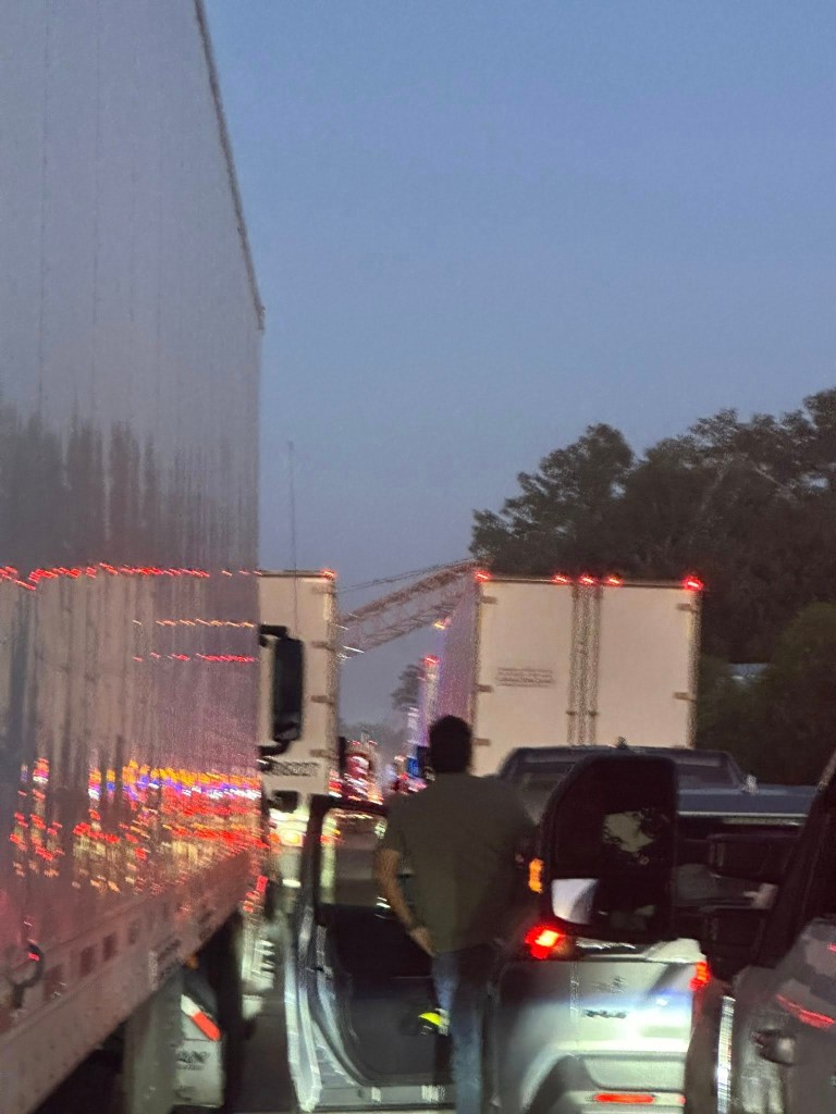 Photo of a traffic jam caused by a construction crane hijacking.