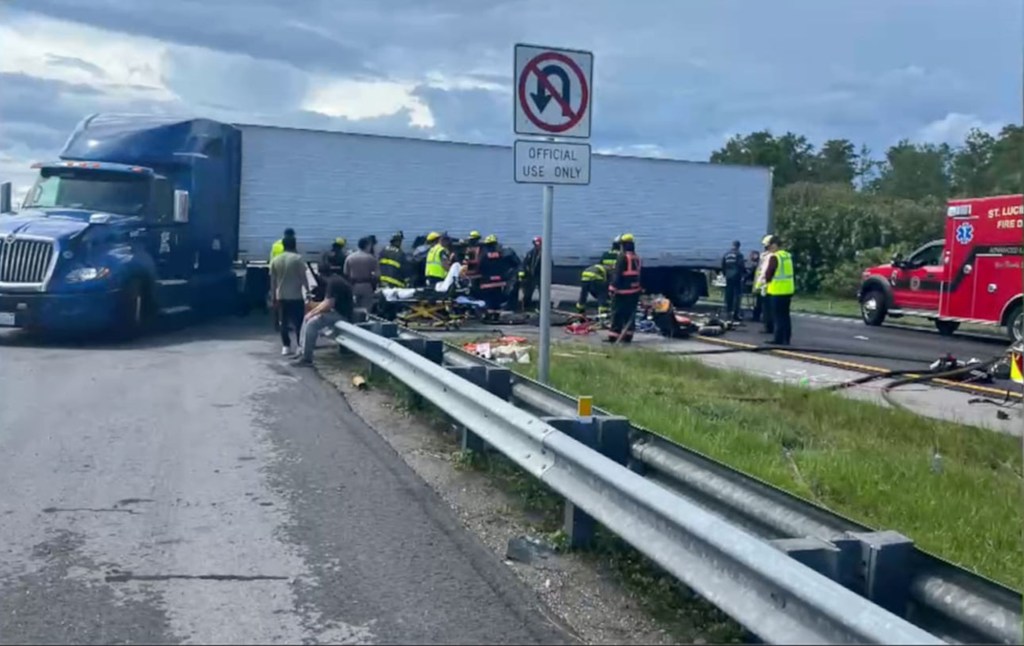 Aftermath of a fatal semi-truck and minivan crash.
