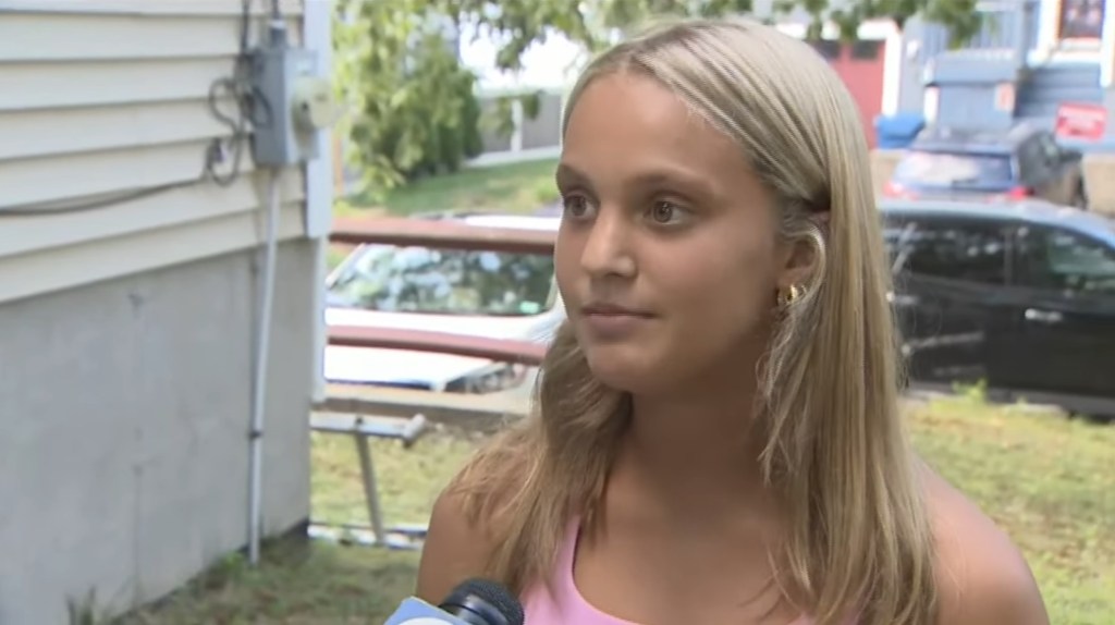 Teenage girl being interviewed.