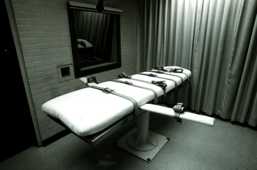 A death penalty execution table with restraints.