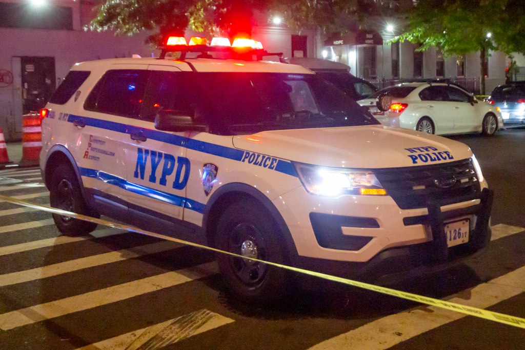 The off-duty cop was standing outside of a residential building by West 173rd Street and Amsterdam Avenue just before 9:45 p.m. when he was ambushed by two men riding two separate mopeds