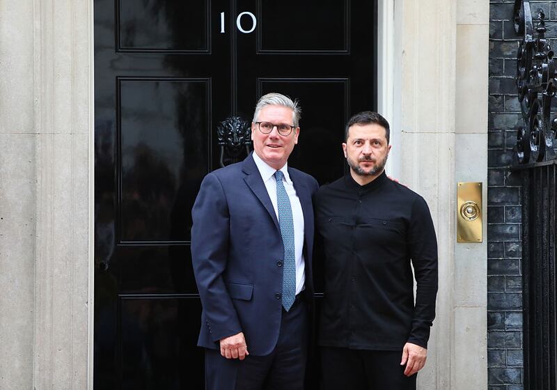 LONDON, ENGLAND - AUGUST 14: Britain's Prime Minister Keir Starmer greets Ukrainian President Volodymyr Zelenskyy at number 10 Downing Street on August 14, 2025 in London, United Kingdom. Zelenskyy's UK visit comes following his trip to Berlin to attend virtual meetings with European leaders and US President Trump to discuss the strategy for talks taking place between Trump and Russian President Vladimir Putin on Friday in Alaska, where they will discuss ending the war in Ukraine. (Photo by Alishia Abodunde/Getty Images)