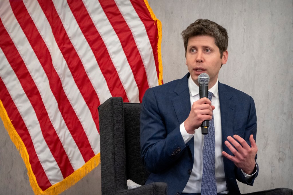 Sam Altman speaking at a conference.