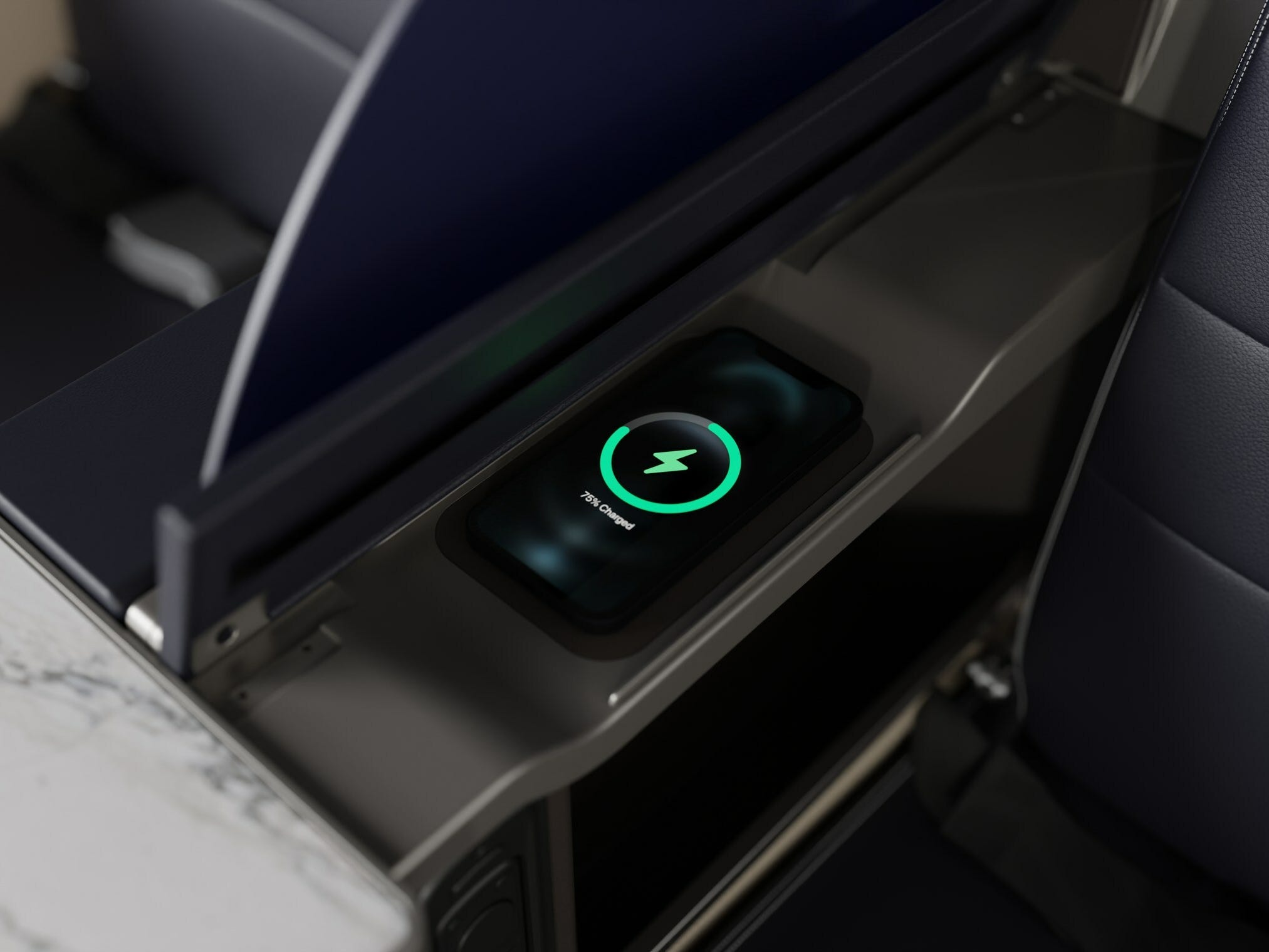 Wireless charging in United Airlines first class.