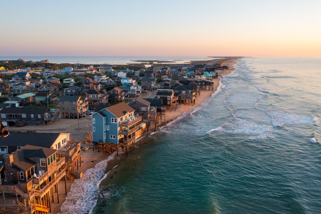 Aerial view of houses on Hatteras Island at sunrise.
