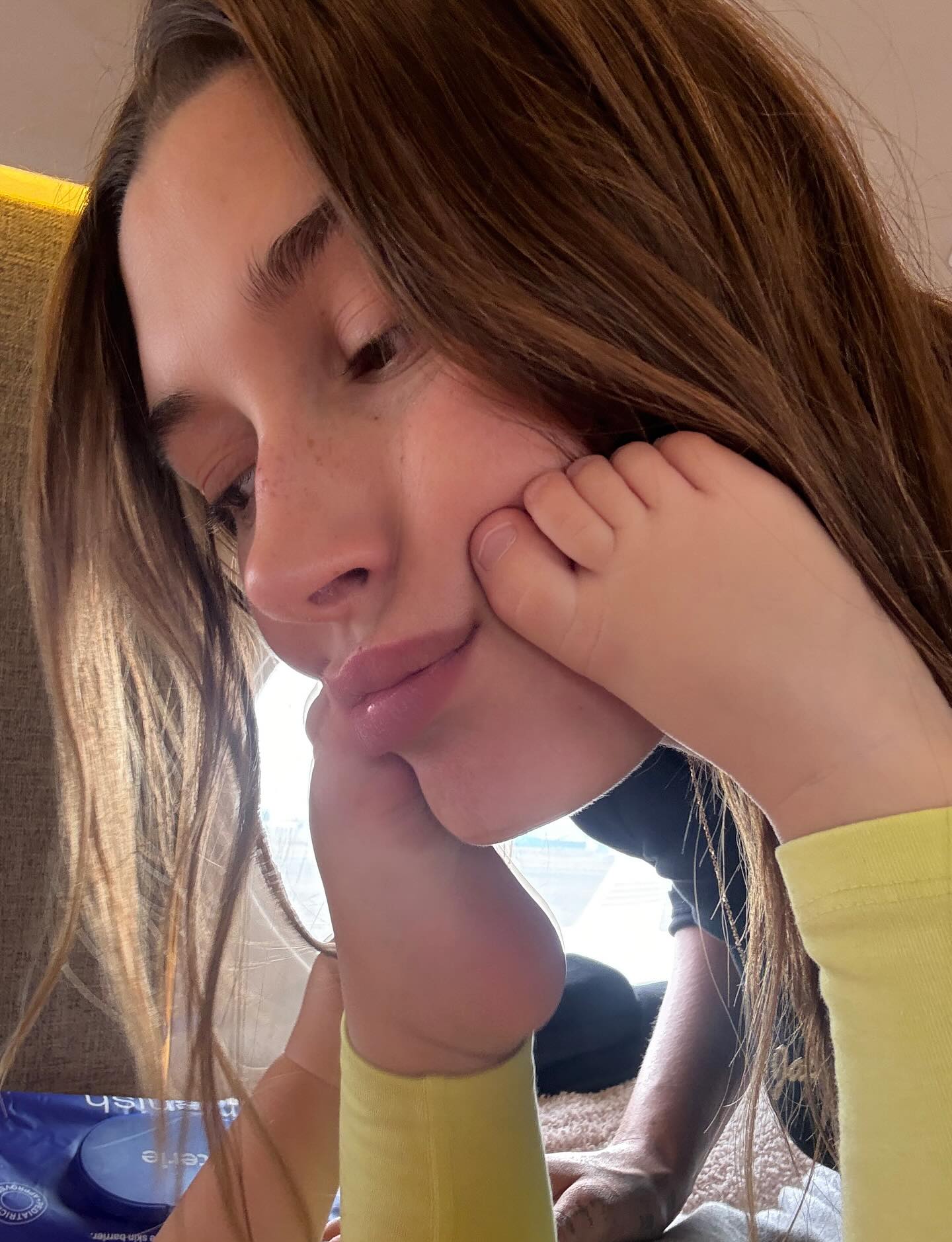 Hailey Bieber shares a sweet moment with her son Jack and his toes.