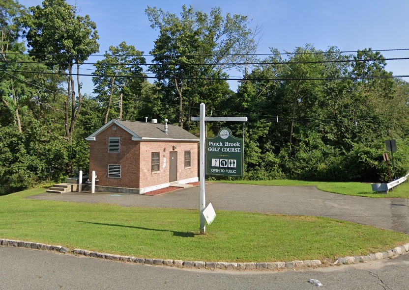 Pinch Brook Golf Course sign and clubhouse.
