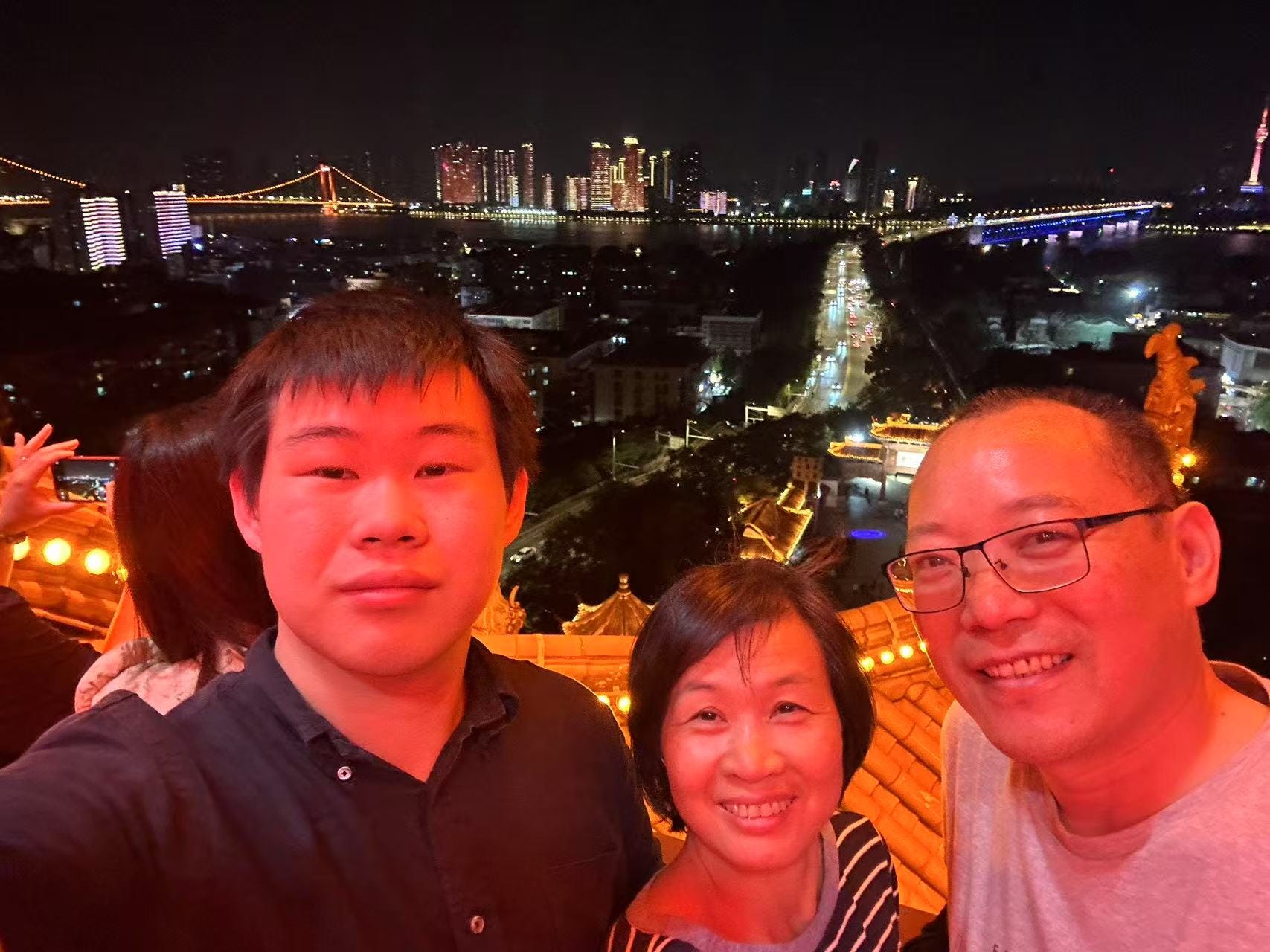 Kennedy Liu with his mom and dad.