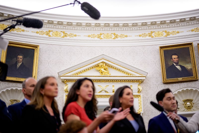 Paintings and gold trim are visible behind reporters as U.S. President Donald Trump holds a swearing in ceremony for interim U.S. Attorney for Washington, D.C. Jeanine Pirro in the Oval Office of the White House on May 28.