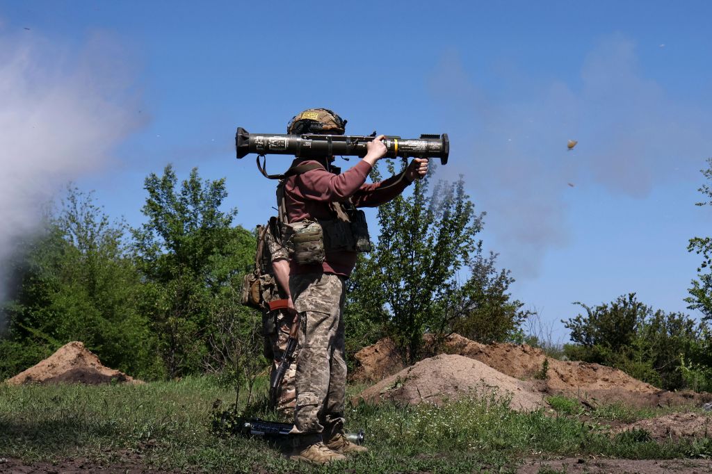 Ukrainian soldier firing an AT4 anti-tank missile launcher.