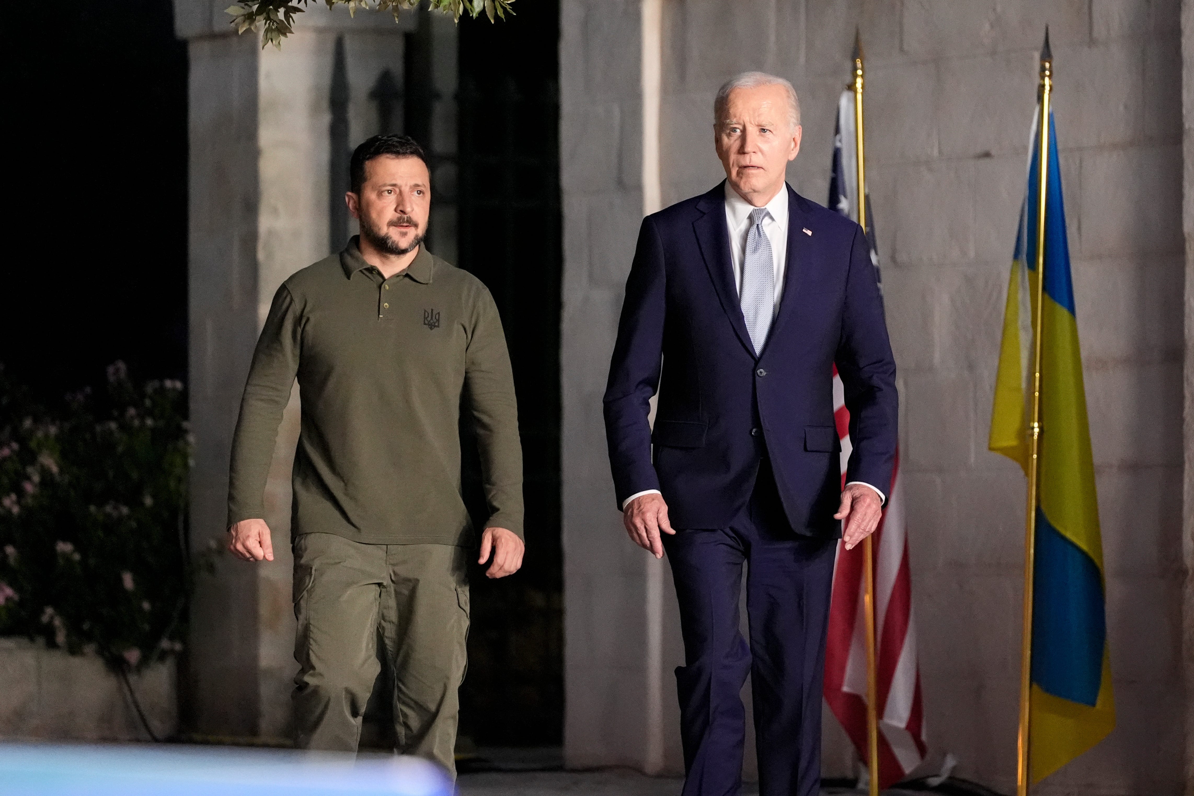 President Joe Biden and Ukrainian President Volodymyr Zelenskyy arrive to sign a bilateral security agreement on the sidelines of the G7, Thursday, June 13, 2024, in Savelletri, Italy.