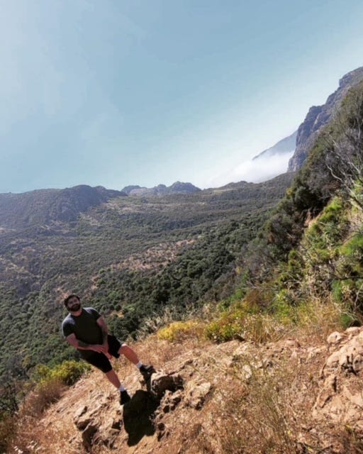 man on hiking trail in California