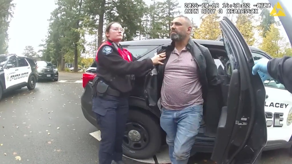 Lacey Police Department bodycam video shows the arrest of Ihsan Ali outside Timberline High School in Lacey, Washington Oct. 18, 2024. 