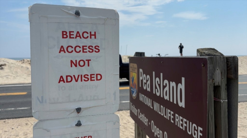 Beach access not advised sign at Pea Island National Wildlife Refuge.